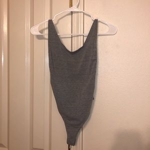gray American apparel bodysuit.